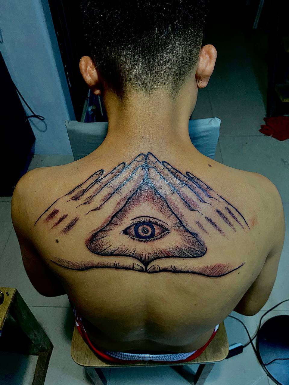 All-Seeing Eye Framed by Hands
