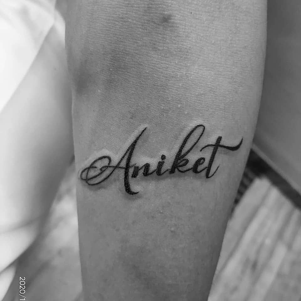 Aniket Script Lettering
