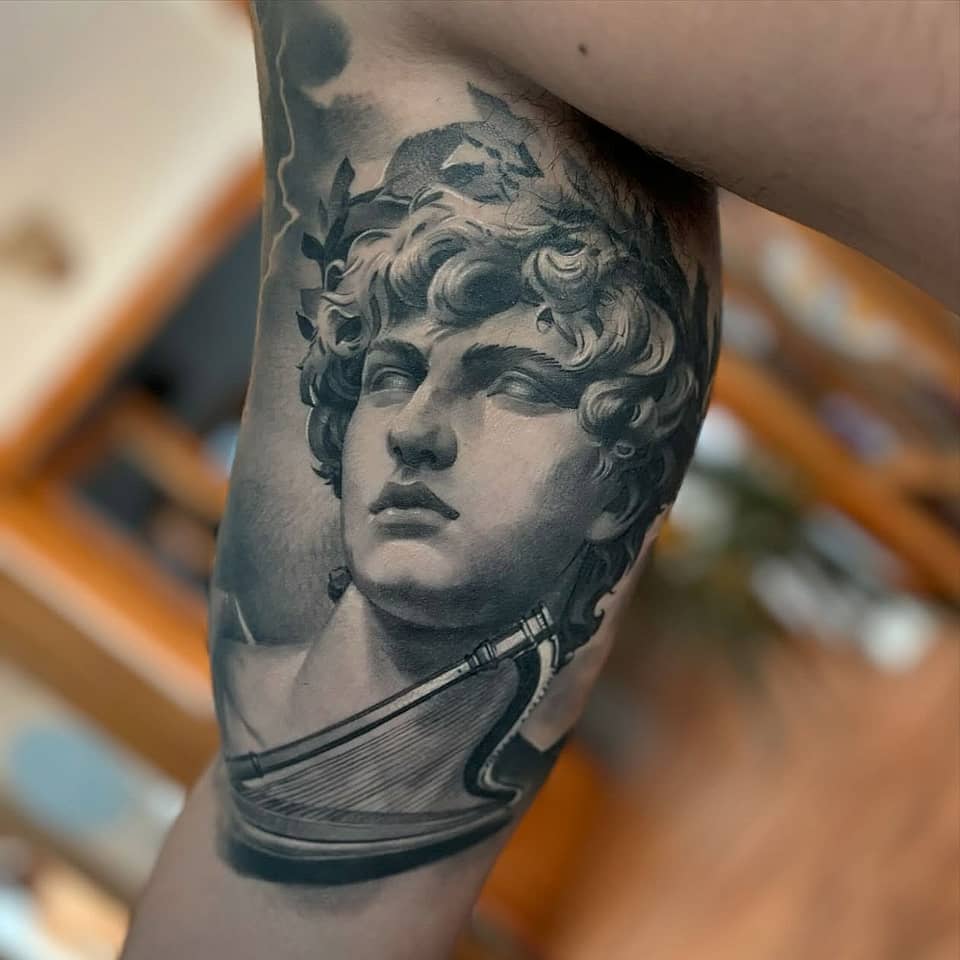 Apollo-Inspired Sculpture Tattoo