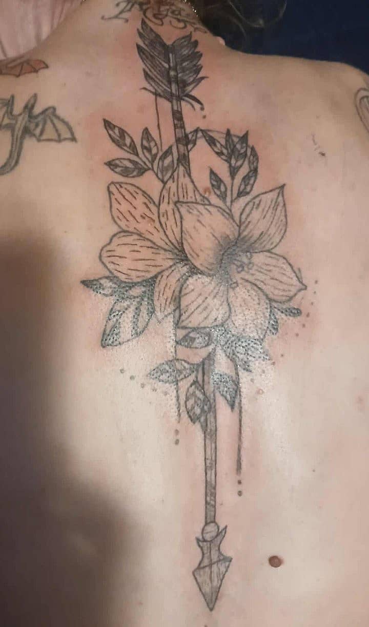 Arrow & Bloom Spine Tattoo