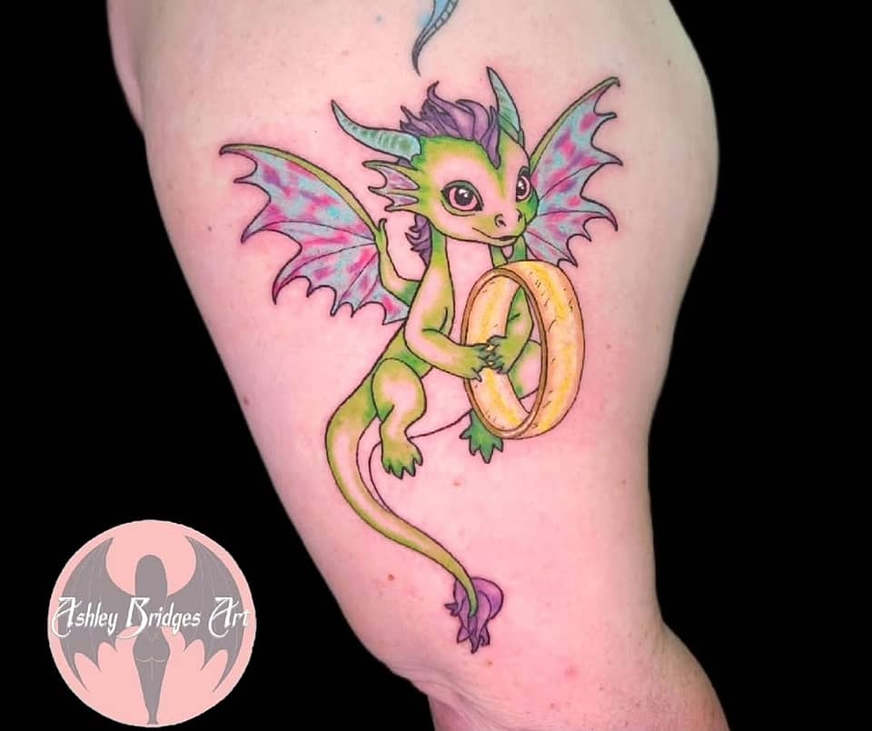 Baby Dragon Holding a Golden Ring