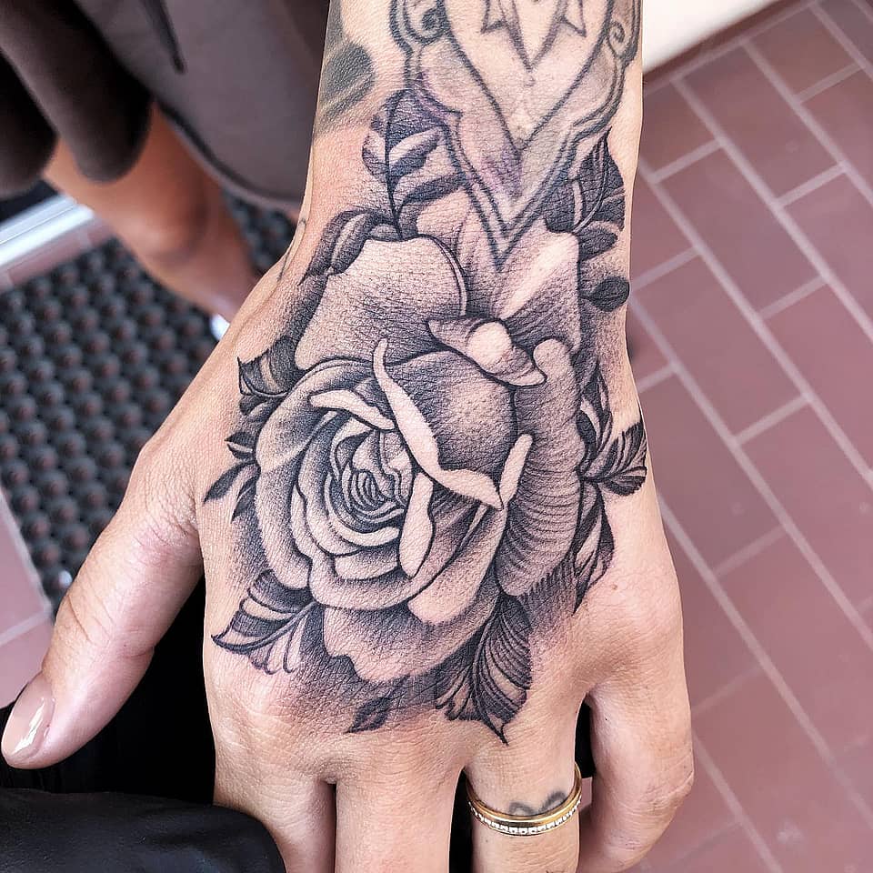 Black-and-Gray Rose Hand Tattoo
