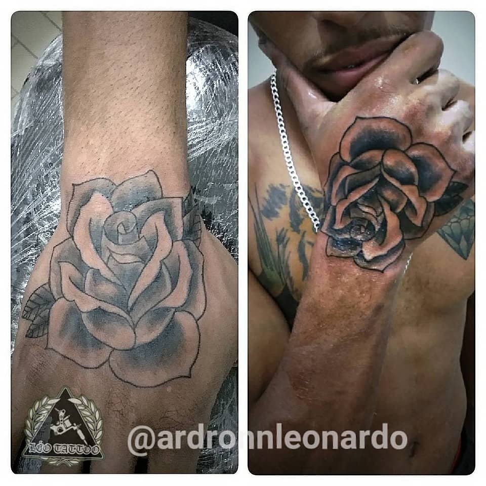 Black-and-Grey Rose Hand Tattoo