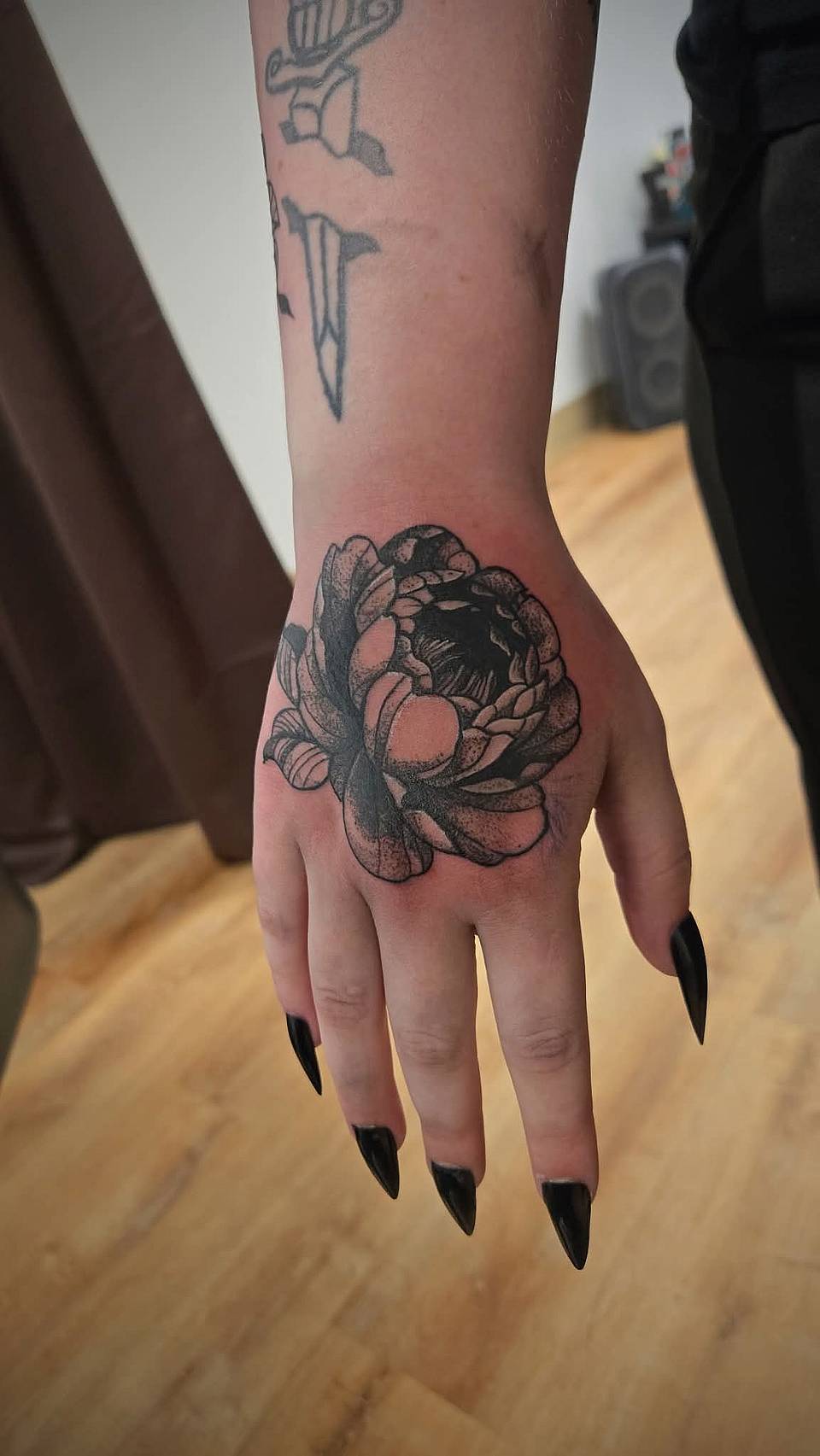 Black Peony Hand Tattoo