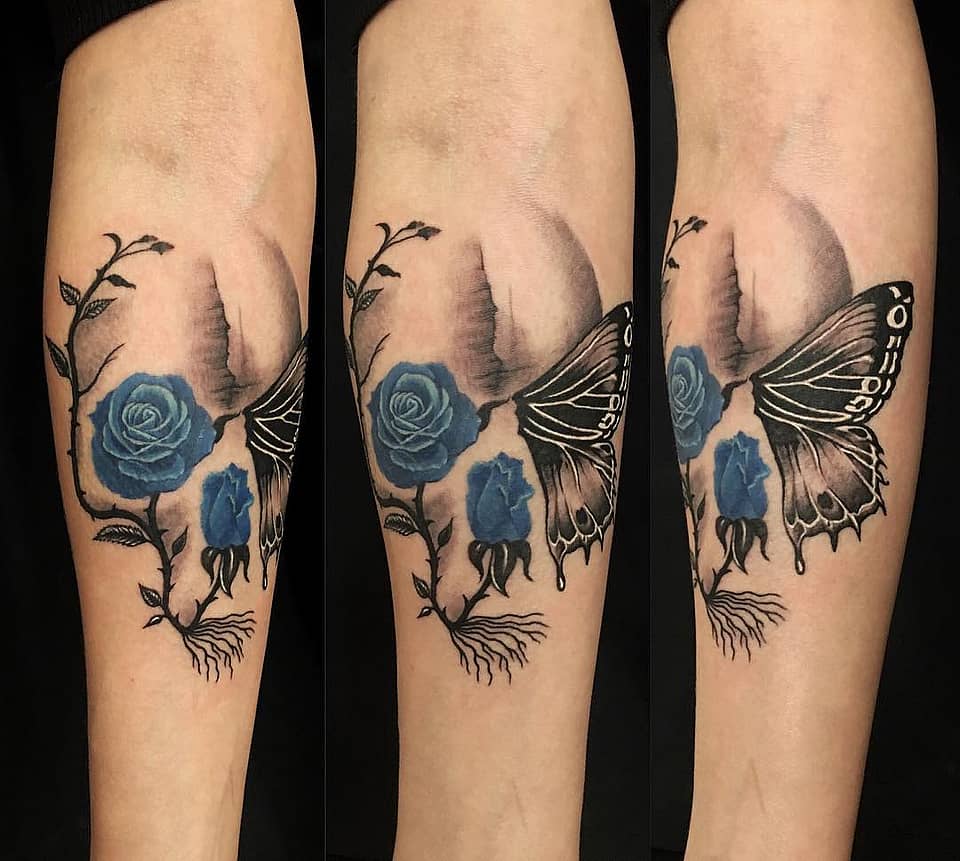 Blue Rose & Moth Forearm Tattoo