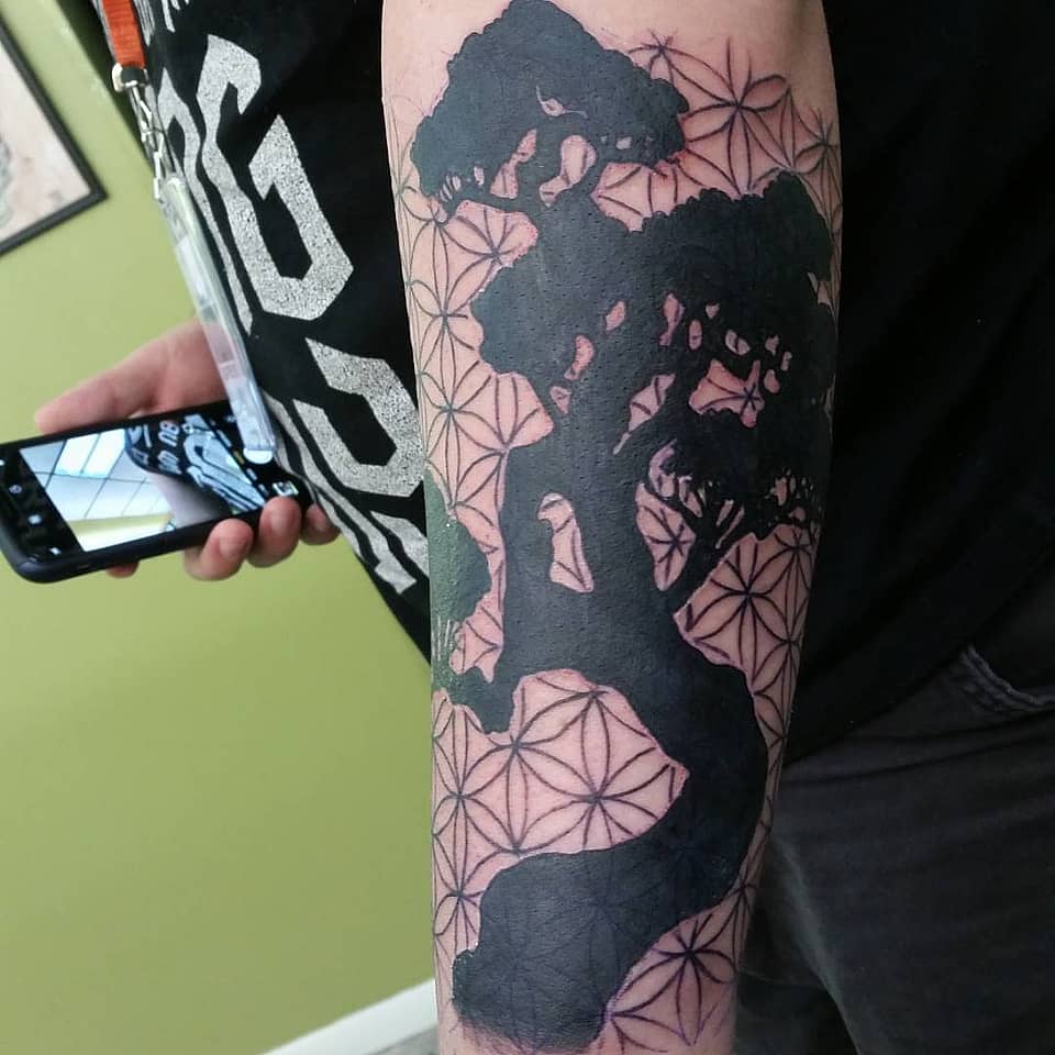 Bonsai Silhouette over Flower of Life