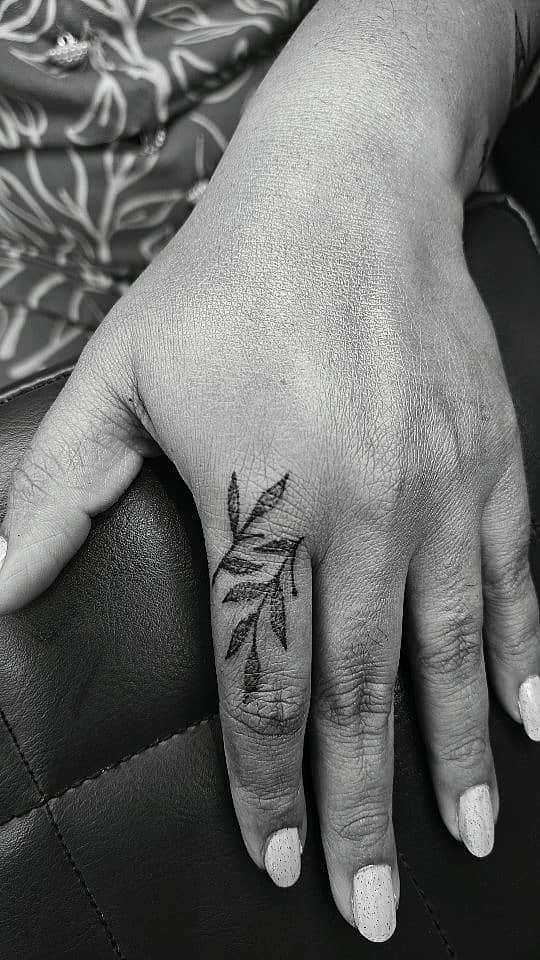 Botanical Sprig on Finger