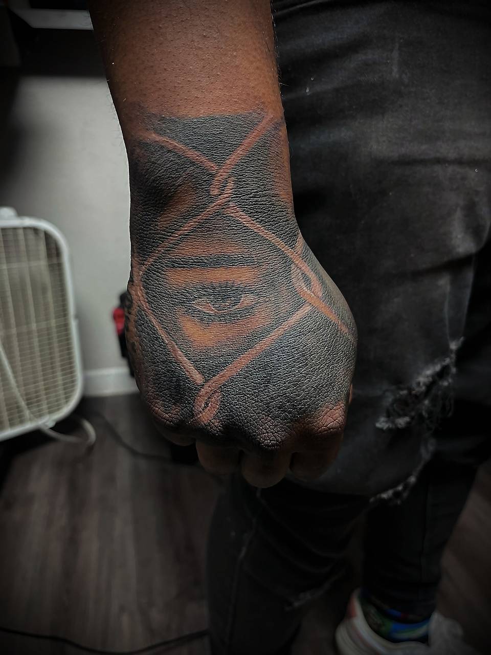 Caged Eye — Blackwork Negative-Space Piece