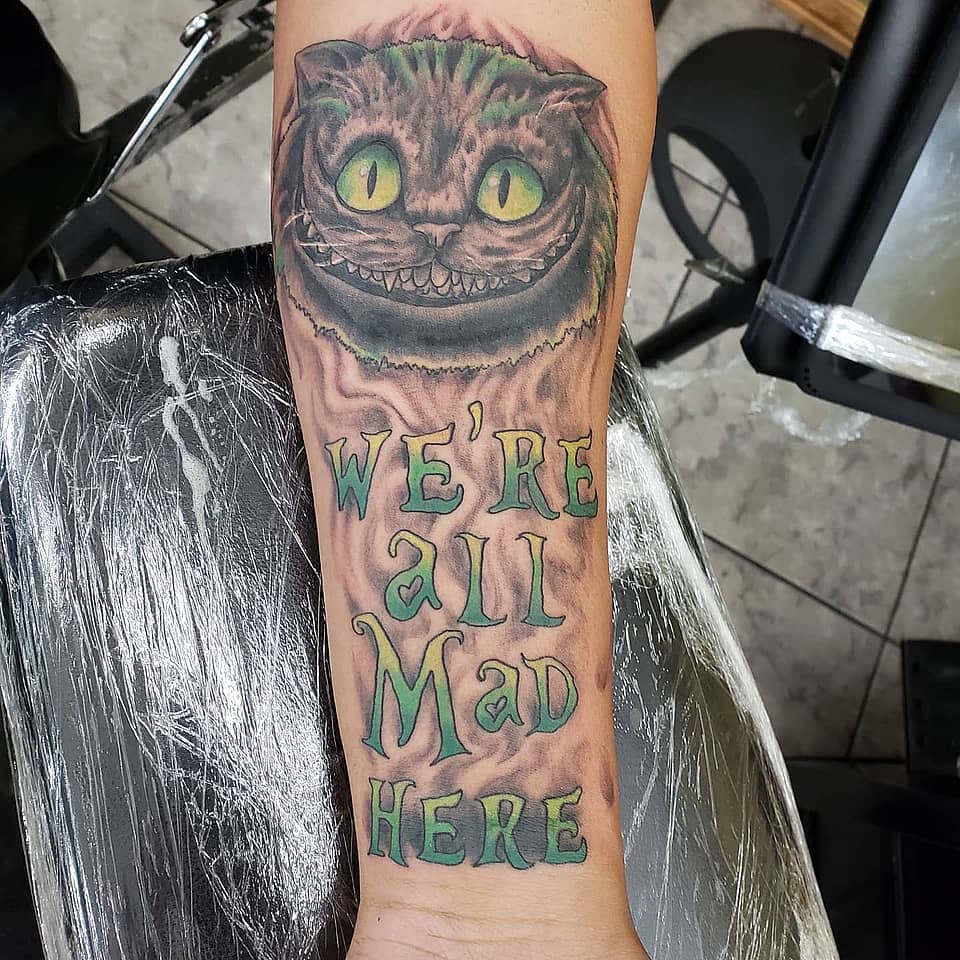 Cheshire Grin: We're All Mad Here