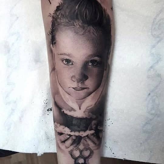 Child Portrait with Beads and Key