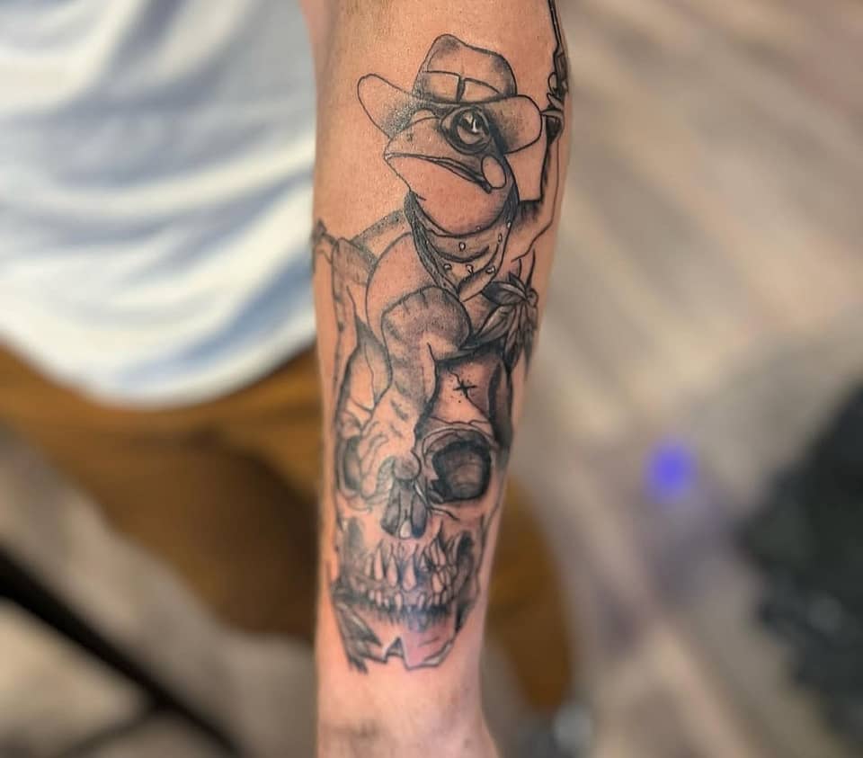 Cowboy Frog Perched on Skull