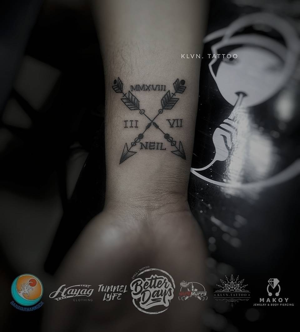 Crossed Arrows Memorial Wrist Tattoo