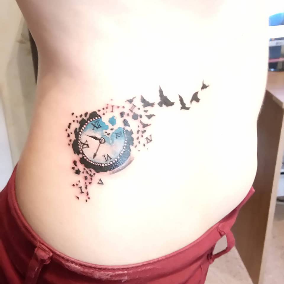 Dissolving Pocket Watch with Flying Birds