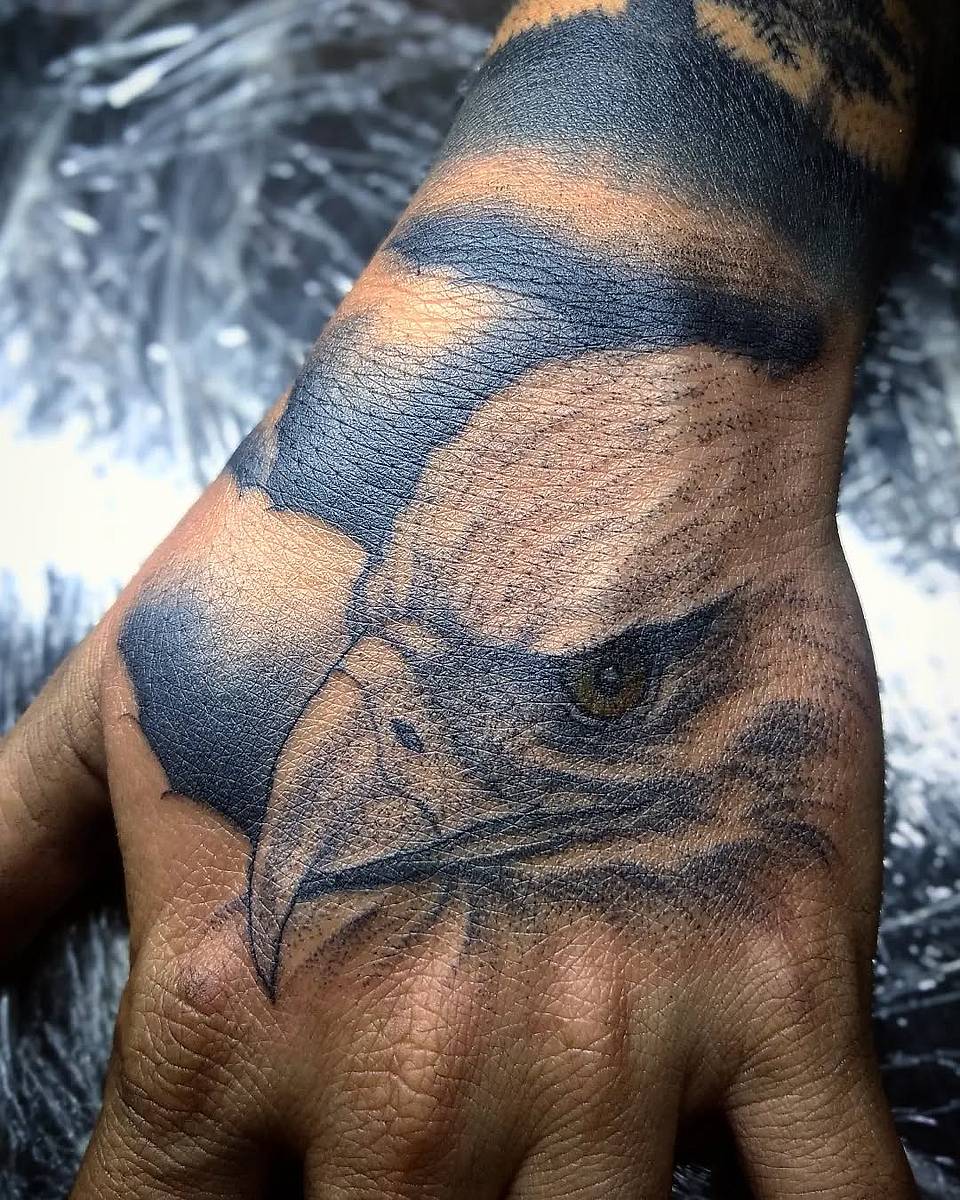 Eagle Gaze Hand Tattoo