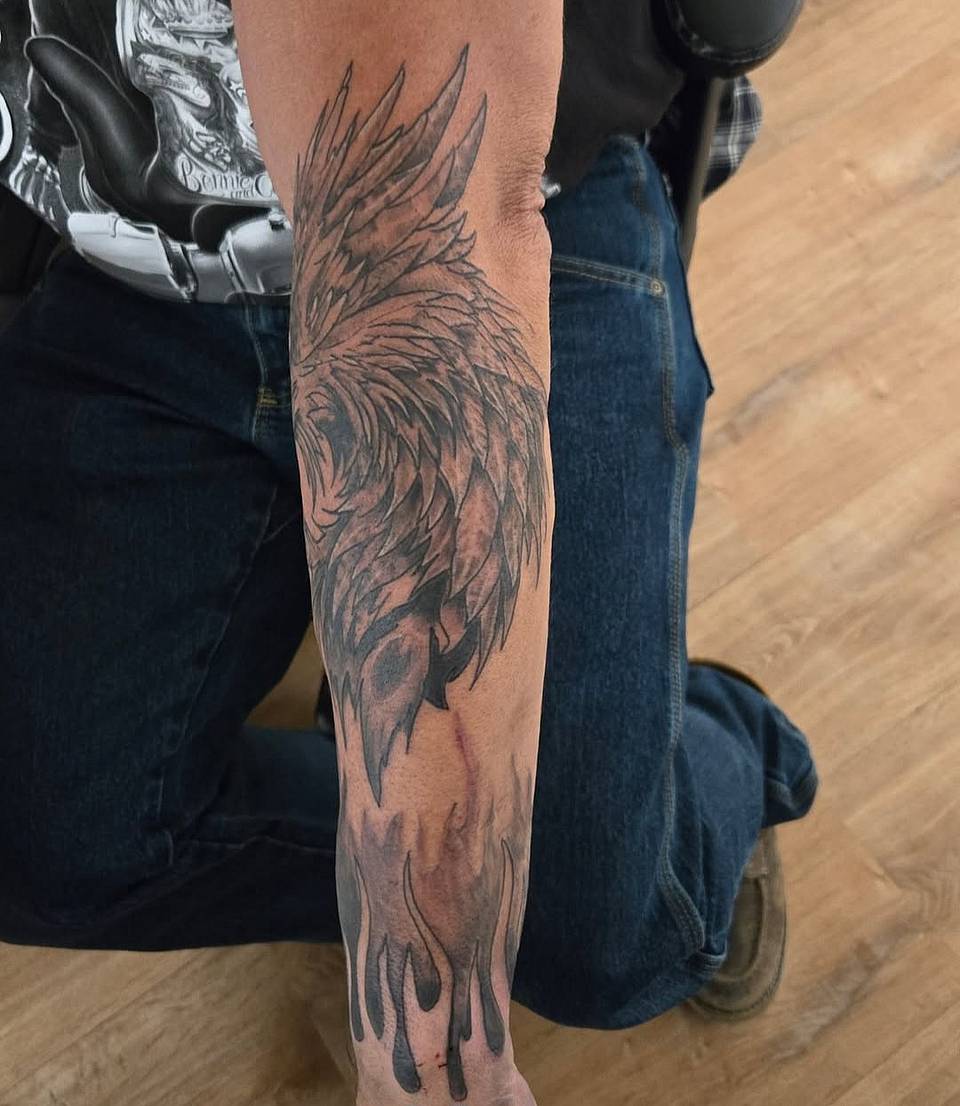 Feathered Wing with Flames