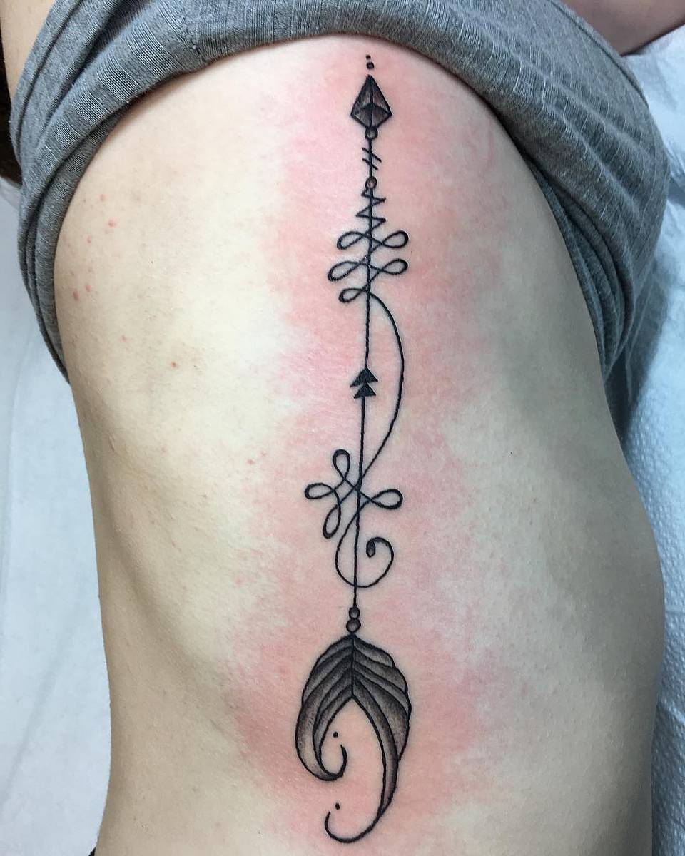 Geometric Filigree Arrow with Leaf