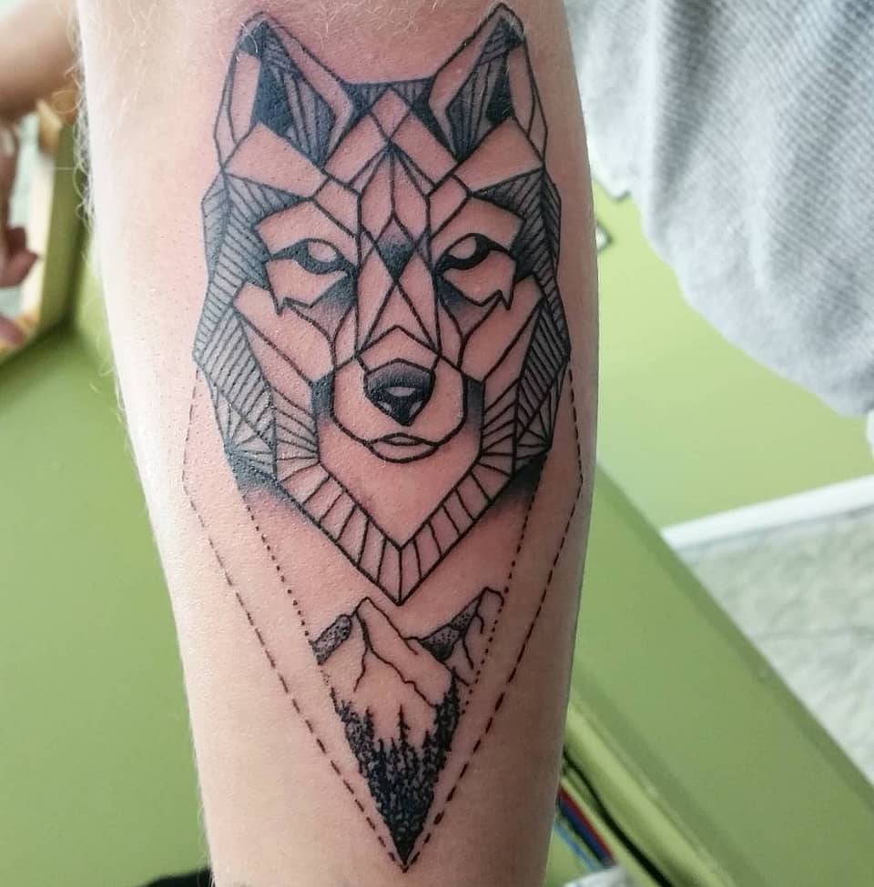 Geometric Wolf and Mountain Crest