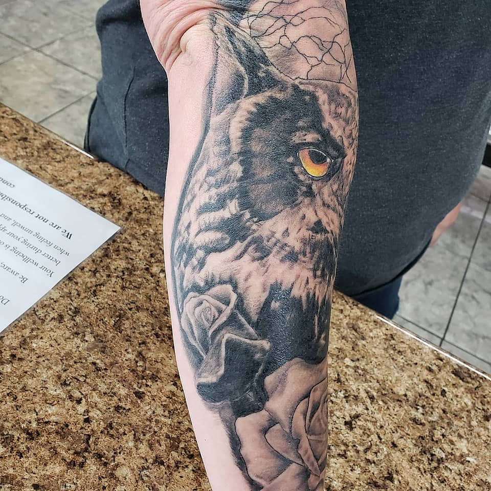 Golden-Eyed Owl and Roses
