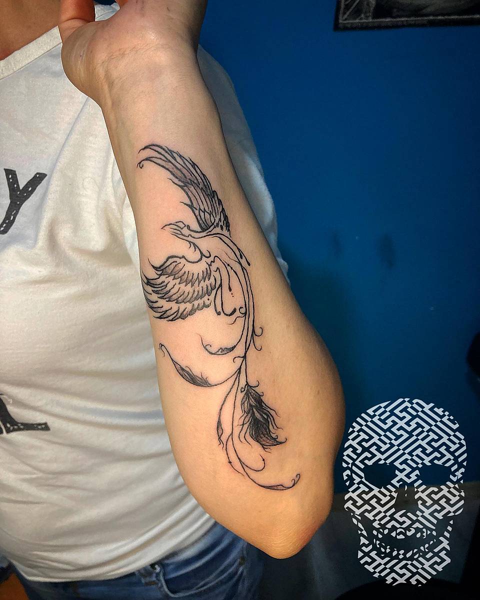 Graceful Phoenix with Flowing Feathers