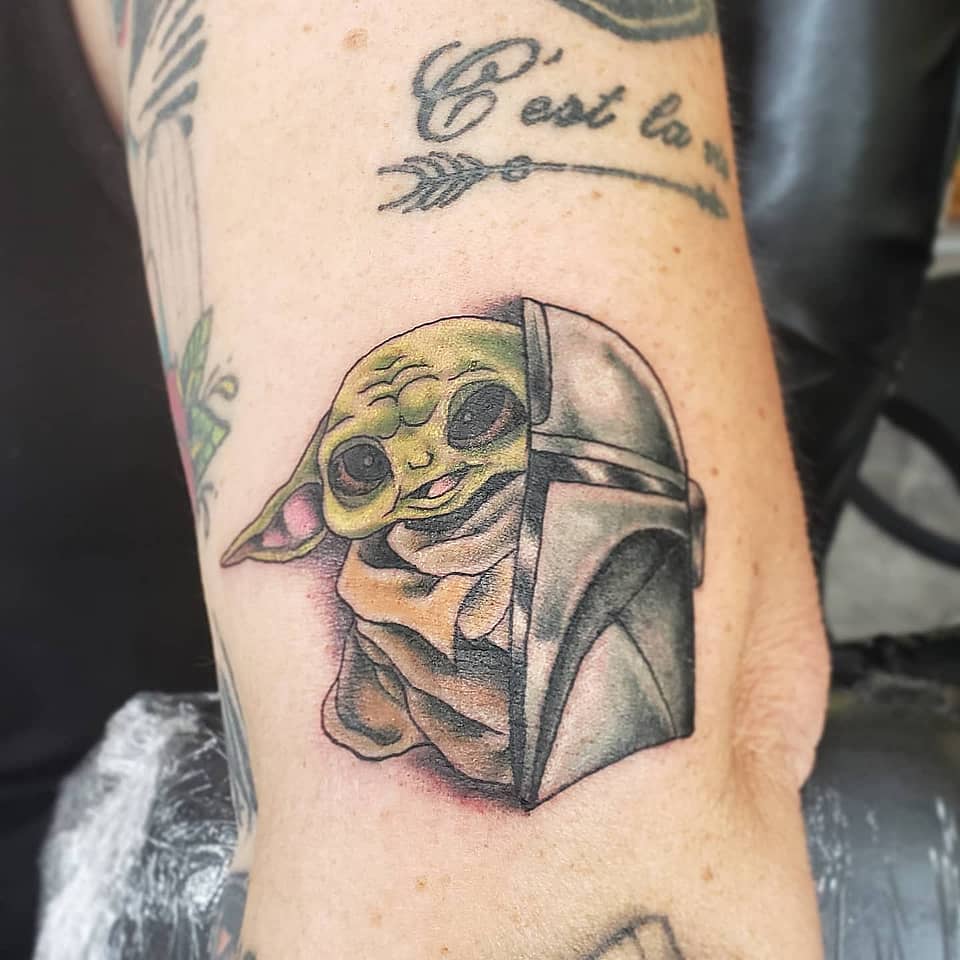 Grogu and the Mandalorian Helm