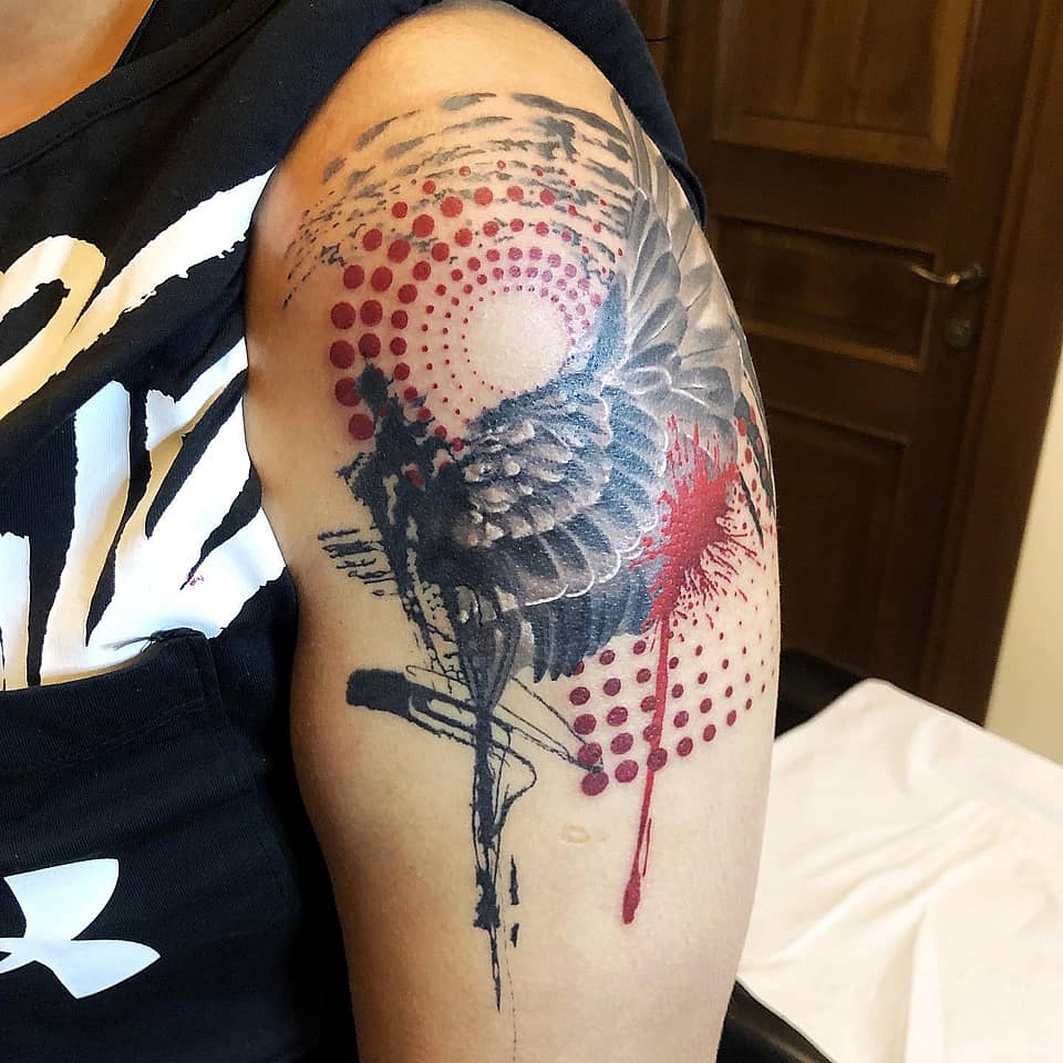 Grunge Angel Wing with Halftone Splash