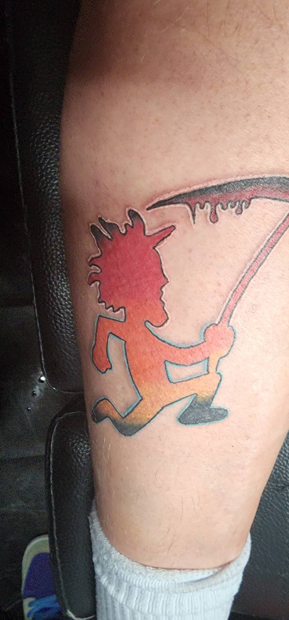Hatchet Man with a scythe