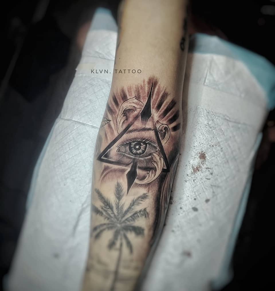 Illuminated Eye in Triangle