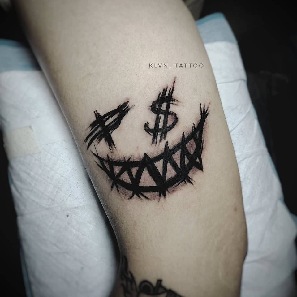 Jagged Grin with Dollar Eyes