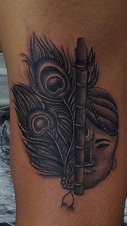 Krishna’s Feather and Flute Half-Face