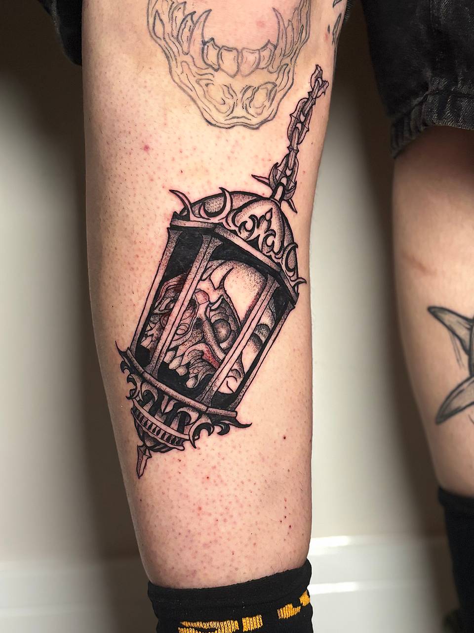 Lantern with Caged Skull