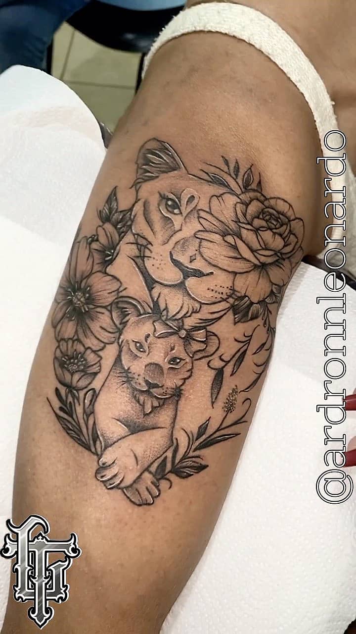 Lioness & Cub Embrace