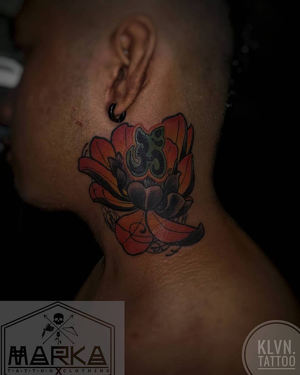 Lotus with Om Neck Tattoo