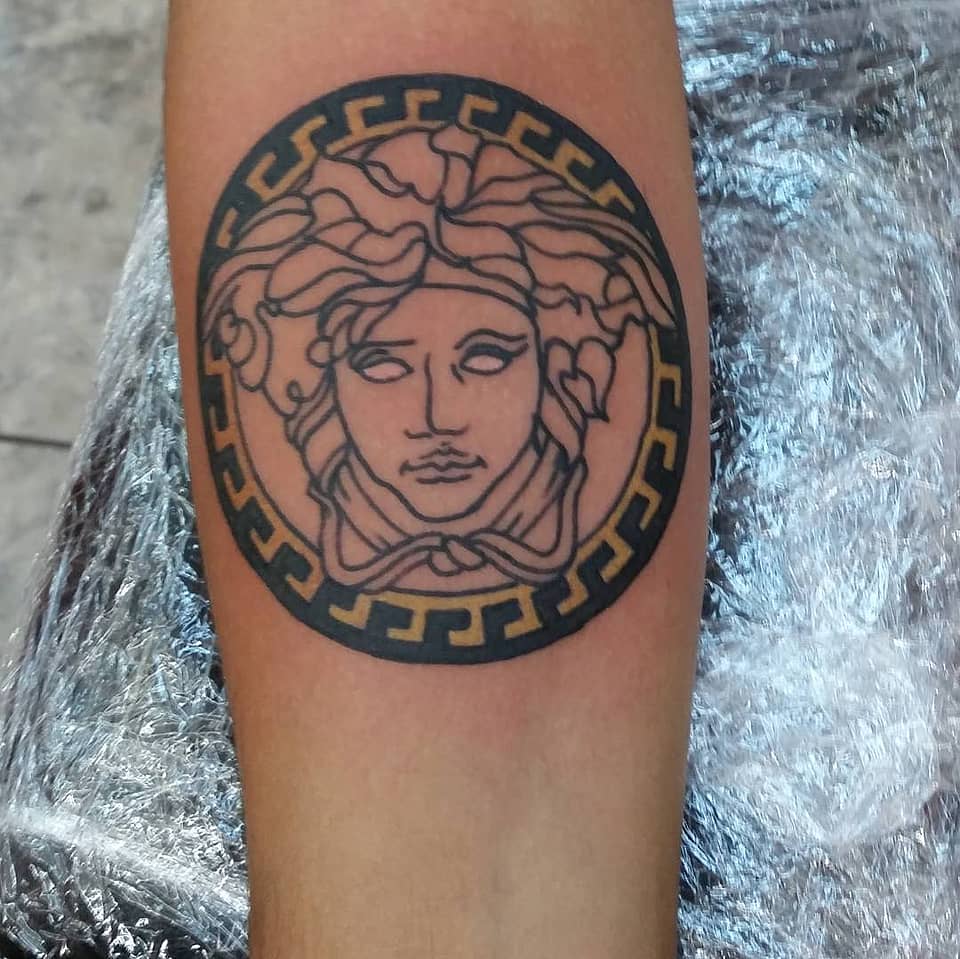 Medusa Emblem with Greek Key Border