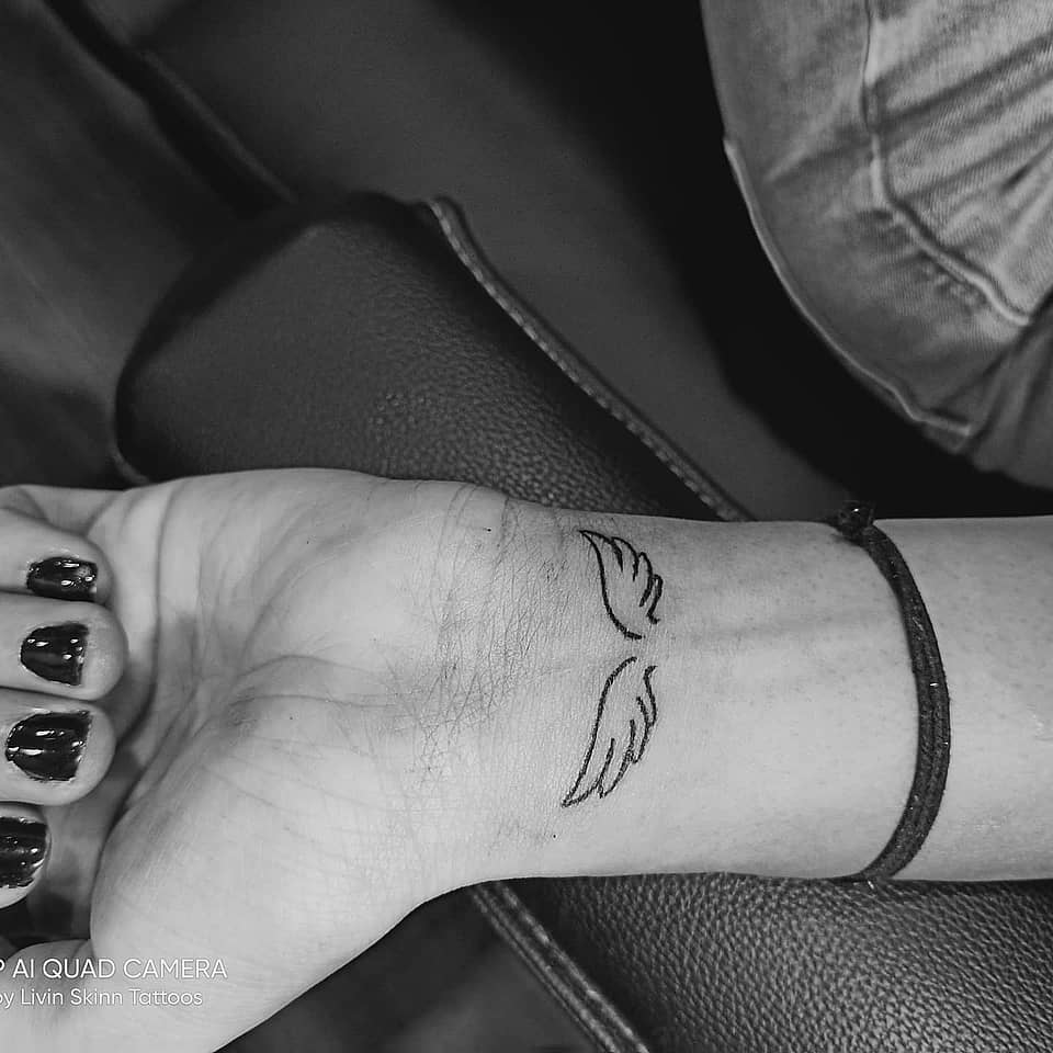 Minimal Angel Wings on Wrist