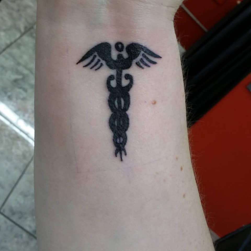 Minimal Caduceus Wrist Emblem
