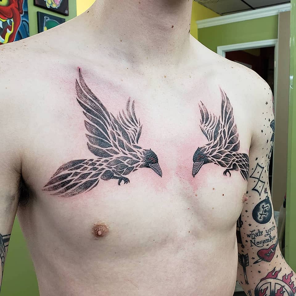 Mirrored Ravens in Flight