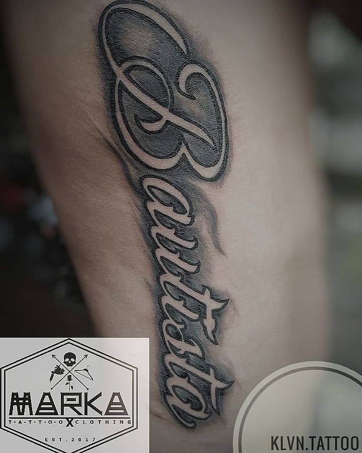 Ornate Vertical Script Lettering