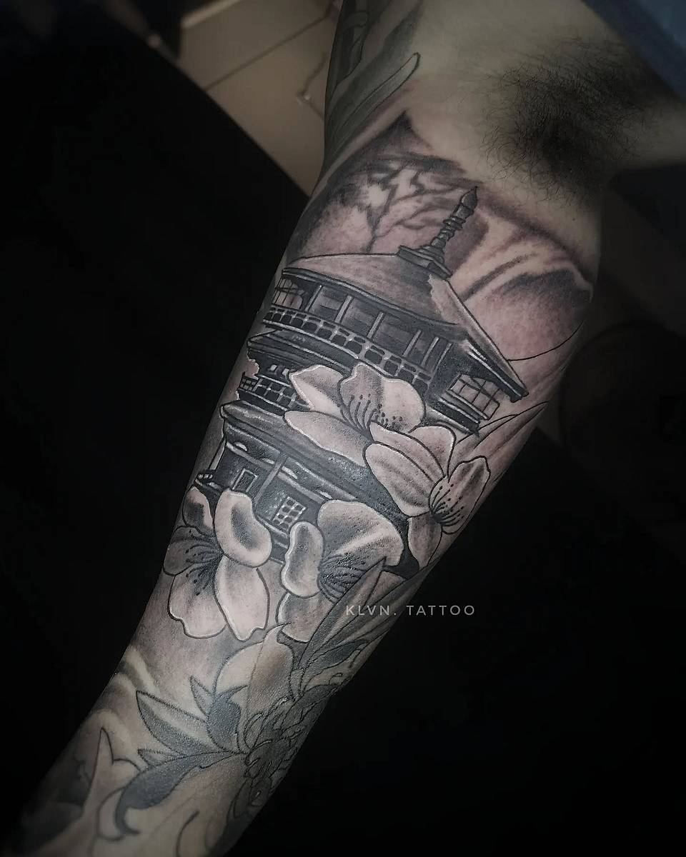 Pagoda & Blossom Inner-Arm Tattoo