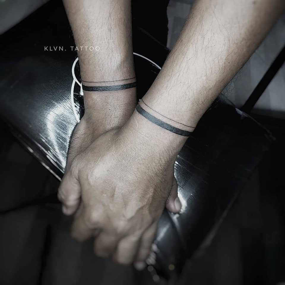 Parallel Black Wrist Cuffs