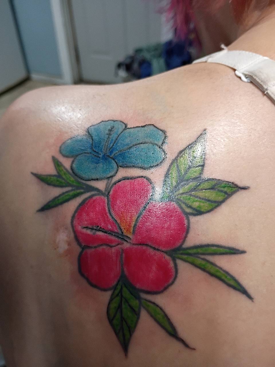 Pink and Blue Hibiscus Chest Tattoo