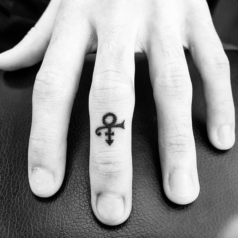 Prince Love Symbol Micro Tattoo