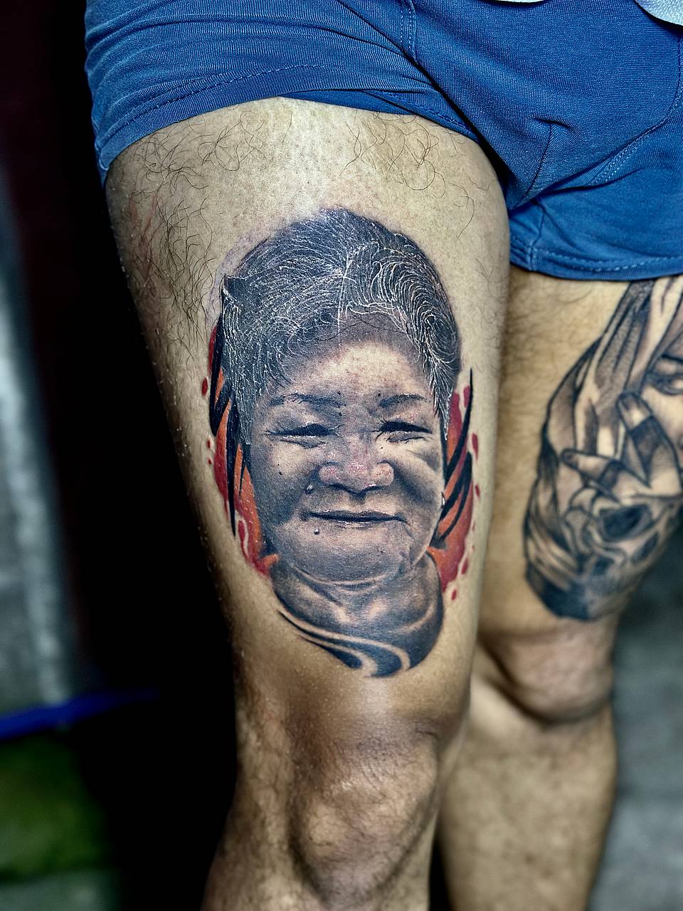 Realistic Thigh Portrait with Red Accents