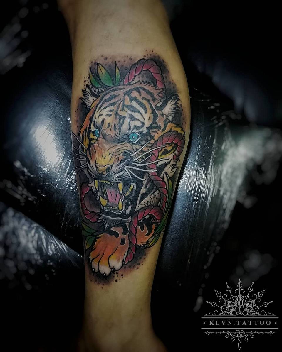 Roaring Blue-Eyed Tiger with Rope