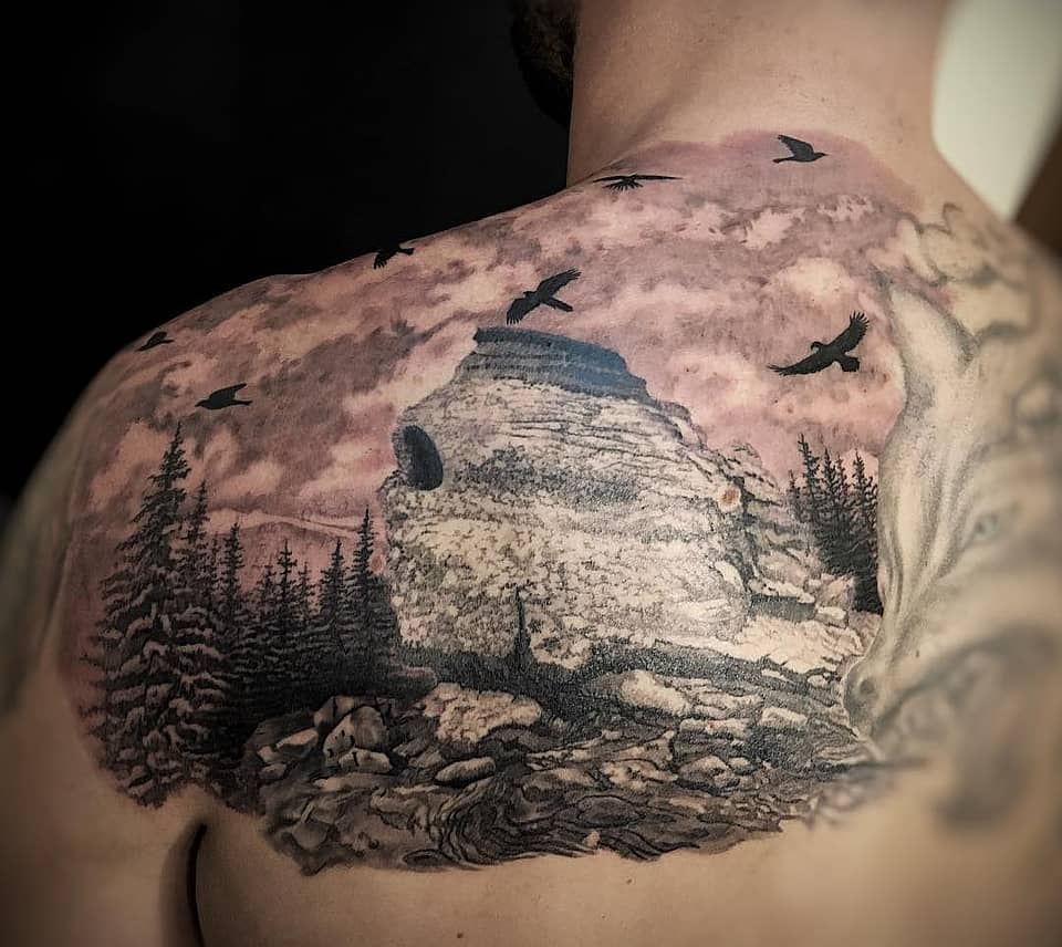 Rocky Peak Landscape with Flying Birds