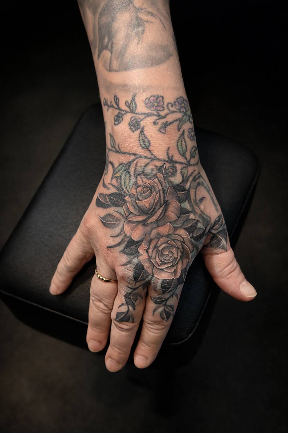 Rose Cluster Hand & Wrist Tattoo
