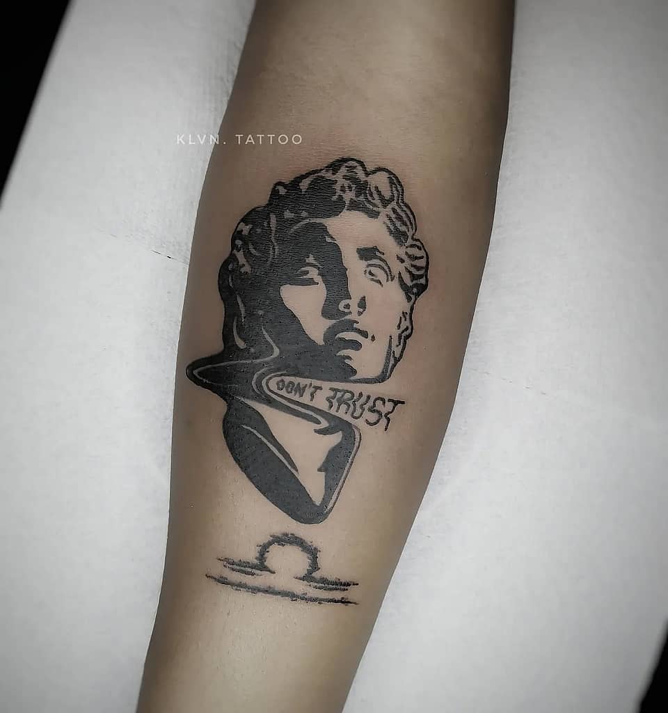 Sculpted Bust with "Don't Trust" Ribbon