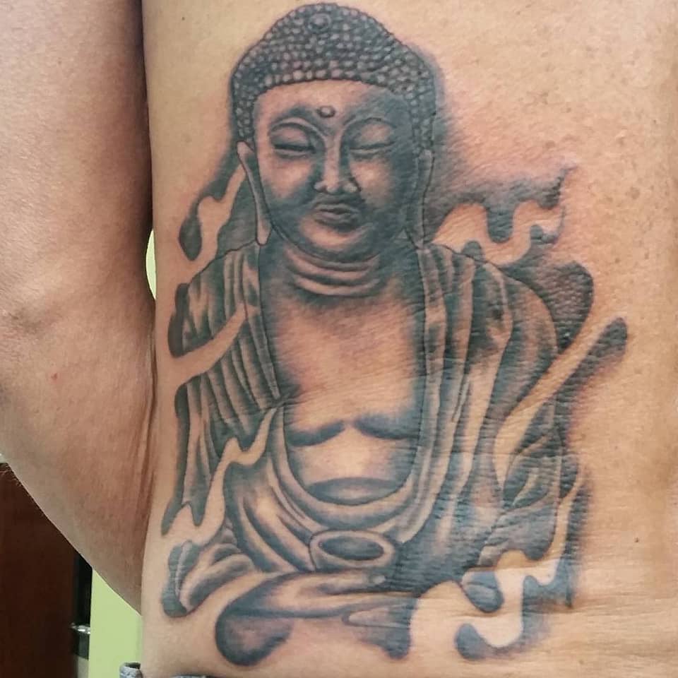 Serene Buddha Amid Smoke