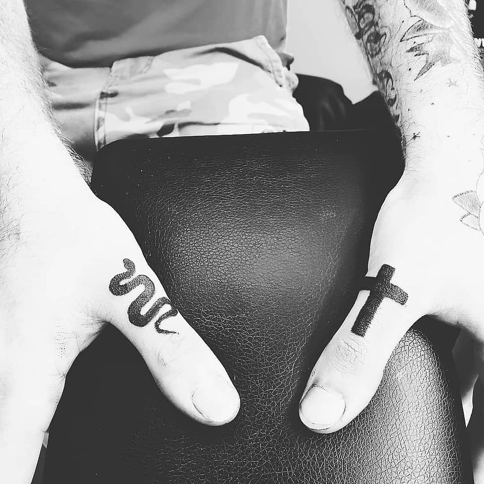 Serpent and Cross Finger Pair