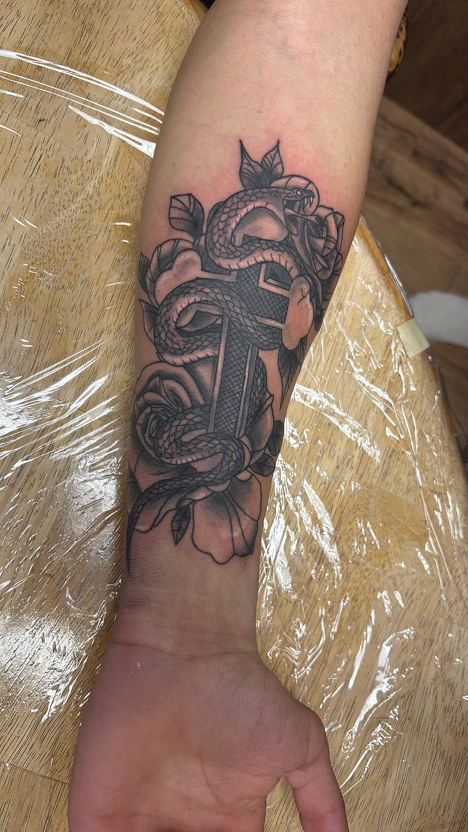 Serpent Wrapped Cross with Roses
