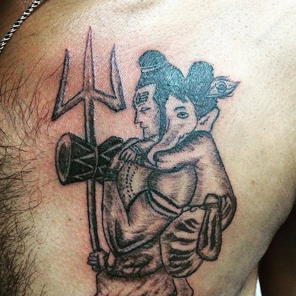 Shiva and Ganesha with Trishul and Damaru